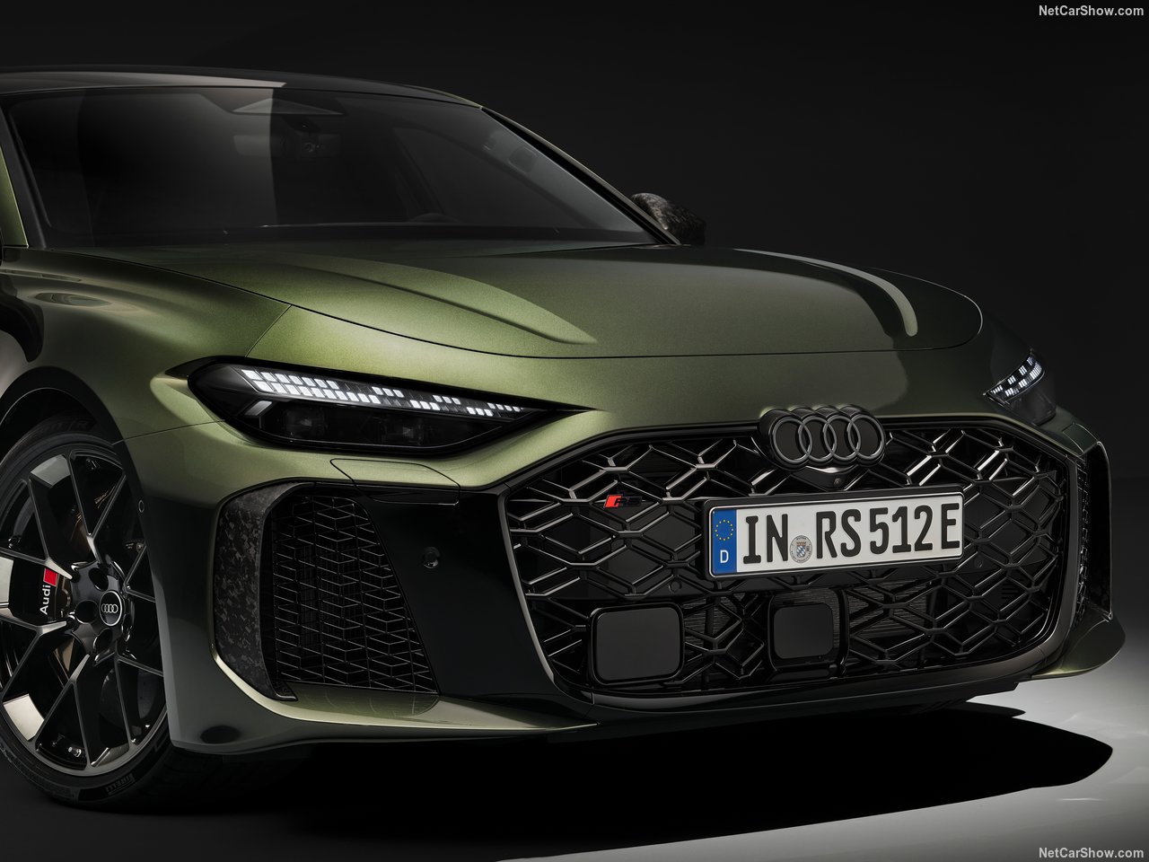 Audi RS badge close up on grey estate car body
