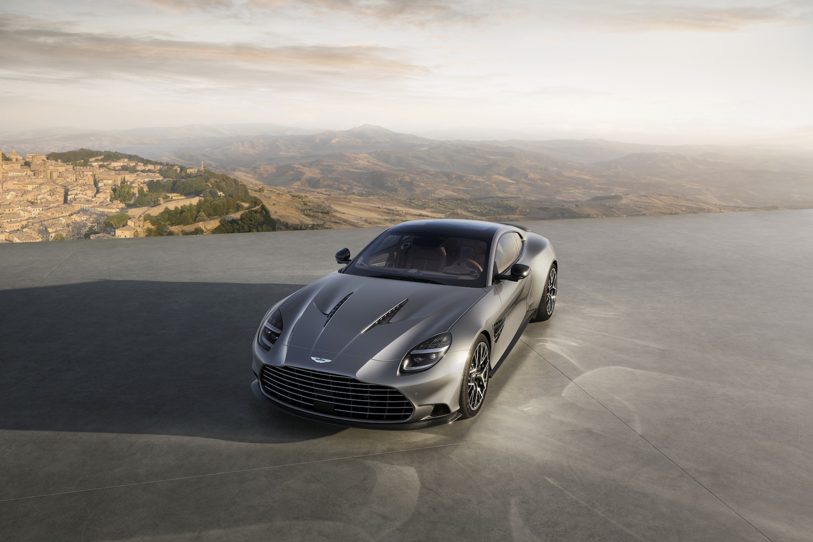 Aston Martin V12 Vanquish heritage lineage silver GT road