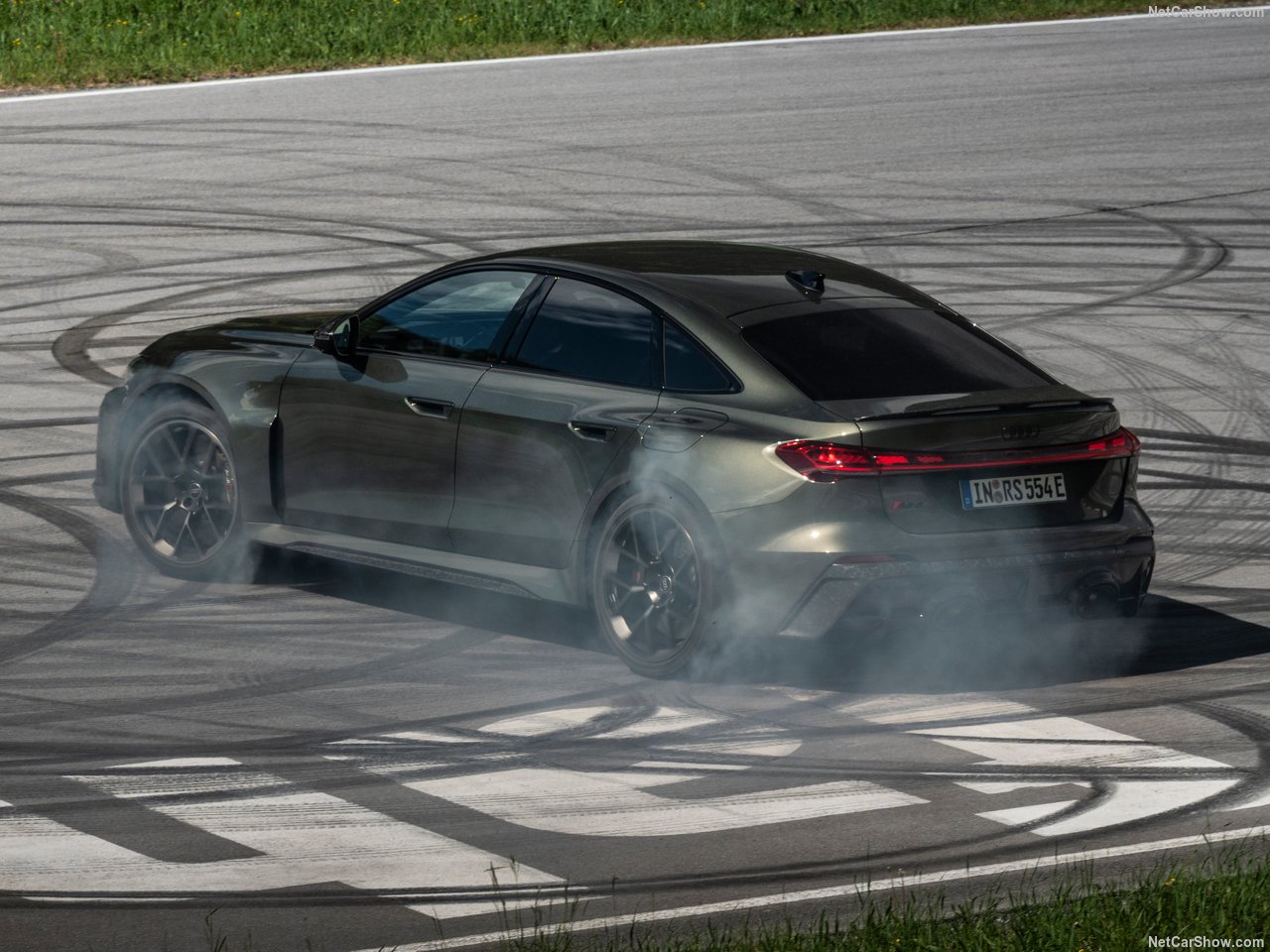 Estate performance car on a racing circuit through fast corners