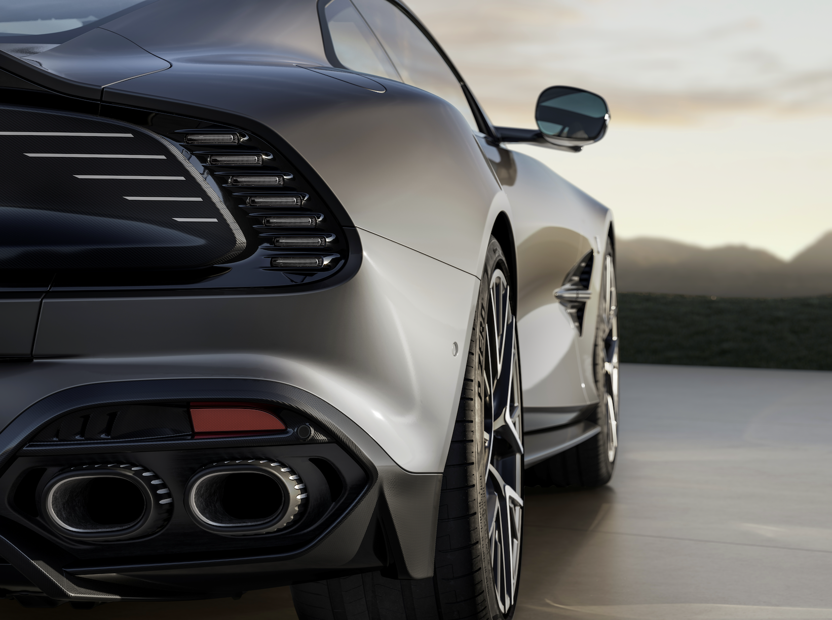Aston Martin Vanquish 25 detail stainless steel side strakes exhaust finisher