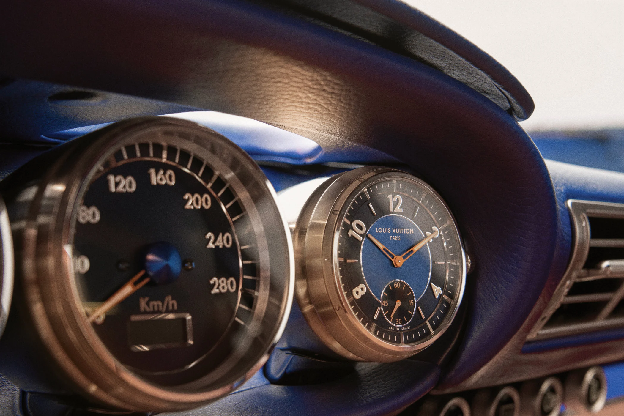 Two contrasting luxury cars comparison mood open road versus atelier