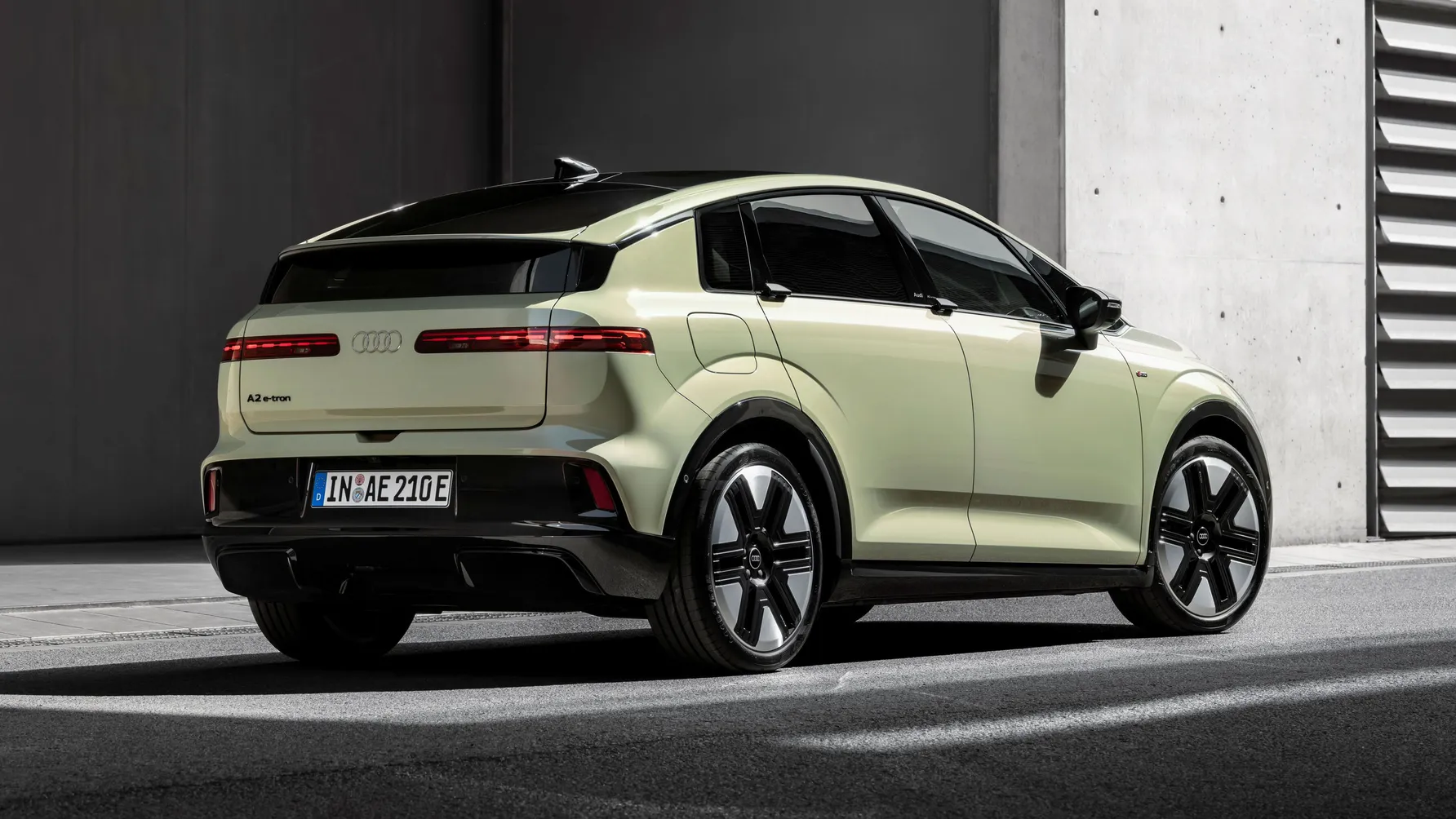 aerodynamic compact electric car silhouette low drag ambiance